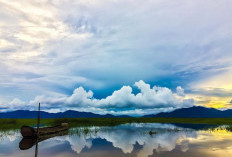 Ini Danau Cantik di Papua, Air danau Kebiru-biruan Dikelilingi Perbukitan Hijau dan Tebing Menawan