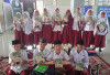 Sedekah Mushaf Qur’an Dorong Penguatan Tutor Sebaya Tahsin di SD Islam Al-Madinah