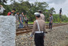 Disenggol Kereta Api, IRT Patah Tangan