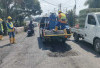 Respons Cepat Dua Perusahaan Tambang di Muara Enim, Turun Langsung Bersama Warga Perbaiki Jalan Negara di Pula